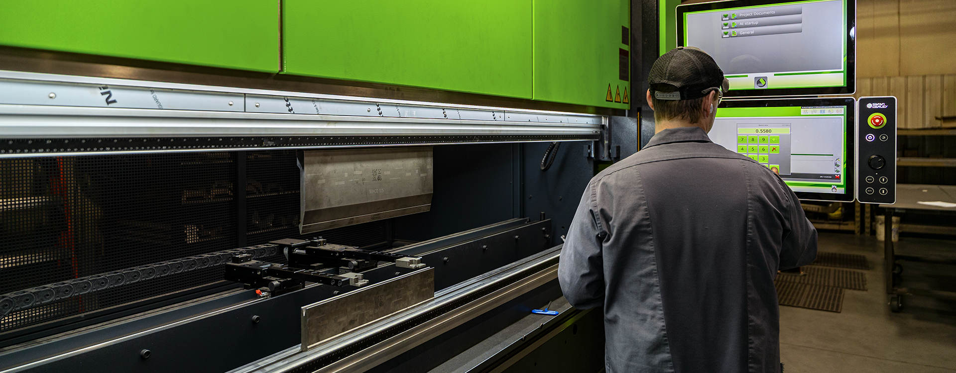 SafanDarley Metal Press Brake Operator for Sheet Metal Fabrication in Greenville, Wisconsin SafanDarley press brake operator performing sheet metal bending at Midwest Sheet Metal & Fabrication in Greenville, Wisconsin.