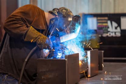 Welder working on a metal fabrication project at Midwest Sheet Metal & Fabrication serving the Appleton area in Wisconsin.