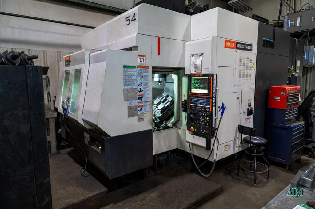 Mazak Variaxis 730 5X II advanced CNC machining center at Advanced Industrial Machine's machine shop serving the Fox Valley in Wisconsin. AIM Quote.